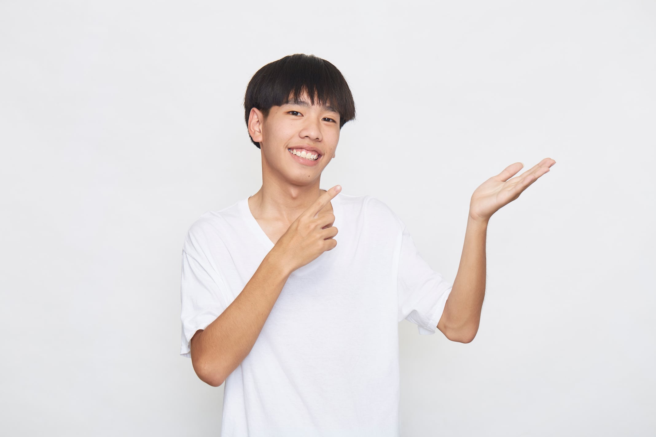 Young Asian men are happy and excited on white